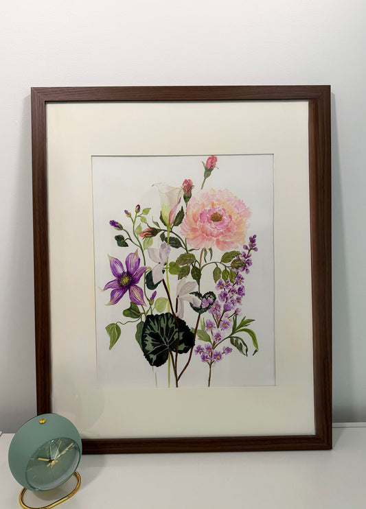 framed original watercolour botanical painting featuring pink, purple, and white flowers with green leaves, set in a dark brown wood grain frame with a white mat. 12 x 18" framed 16 x 20". Easy to hang.