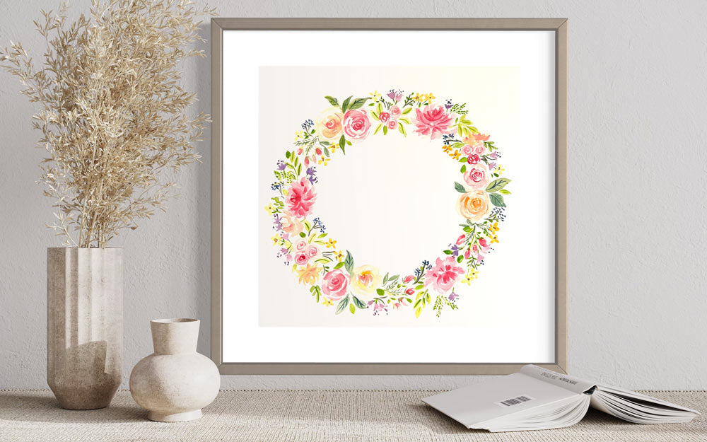 An original wreath flower painting featuring pink, purple blue and orange flowers &nbsp;painted in a circle.